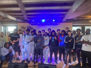 A group of young people from LAB 7 posing for a photograph.